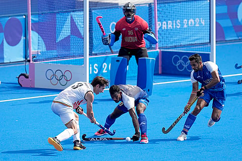 Amit Rohidas blocks Belgium's Thibeau Stockbroekx